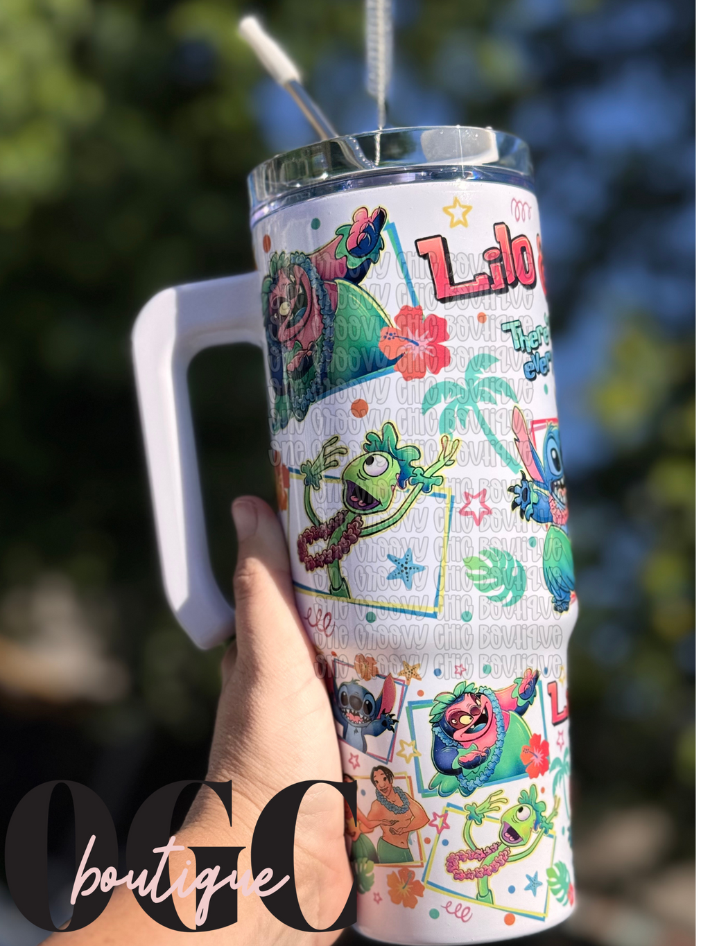 Blue alien inspired Tumbler with metal straw and rubber tip